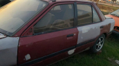 Mazda 323 sol arka kapı orjinal çıkma 1990 - 1995