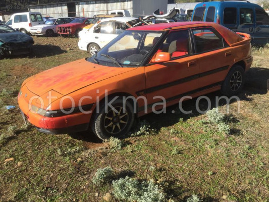 MAZDA 323 H.B SOL ÖN KAPI