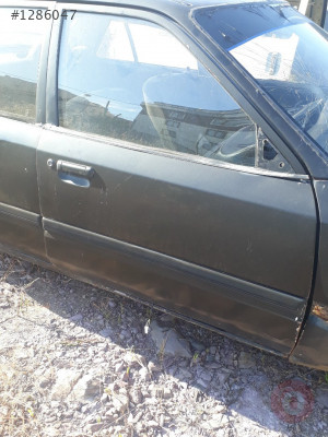 Mazda 323 sag ön kapı