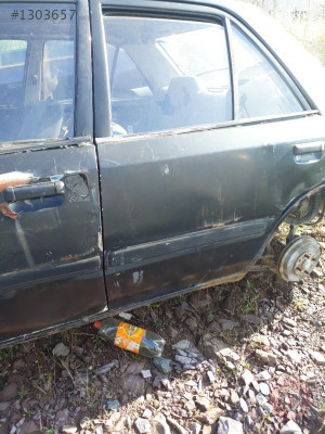 Mazda 323 sol  arka kapı