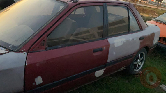Mazda 323 sol ön kapı band çıtası orjinal çıkma  1990 - 1995