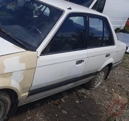 1988 model mazda 323 1.6 çıkma sol takım dolu kapı