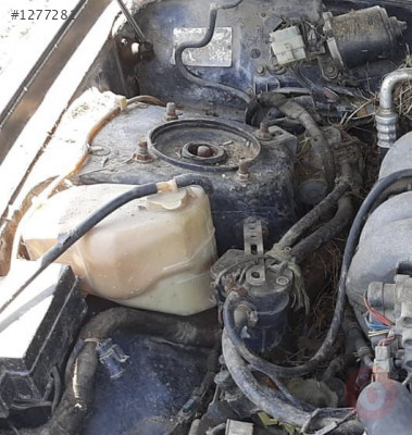 1991 model mazda 929 2.0 çıkma su bidonu