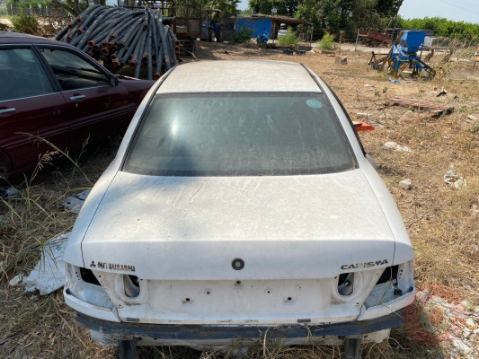 MİTSUBİSHİ CARİSMA ARKA CAM 1996-1999 MODEL