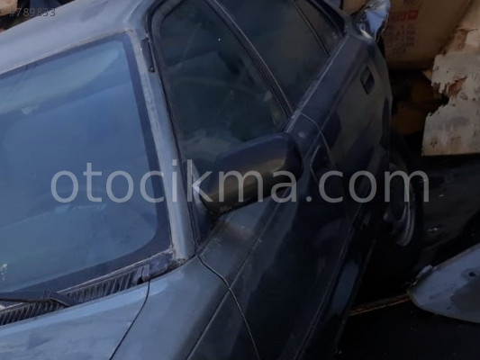 1992 TOYOTA COROLLA SOL DİKİZ AYNASI ORİJİNAL.