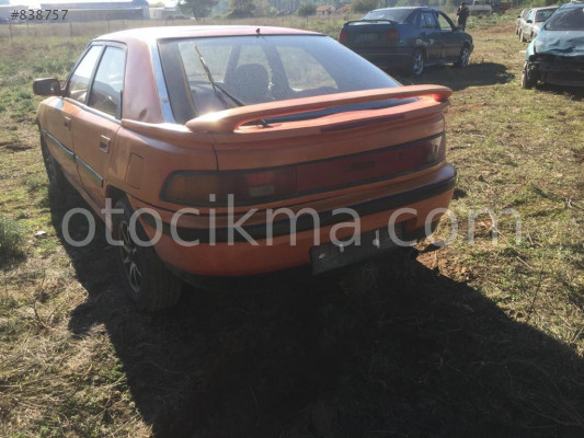 MAZDA 323 H.B ARKA TAMPON