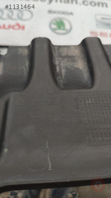 51647307791 bmw x1 arka tampon alt çamurluğu