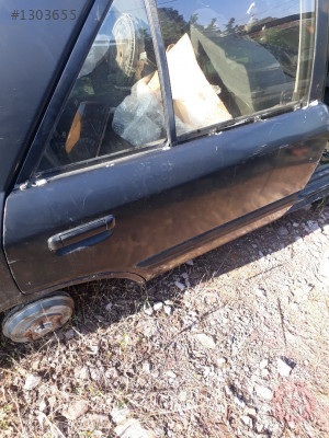 Mazda 323 sag arka kapı