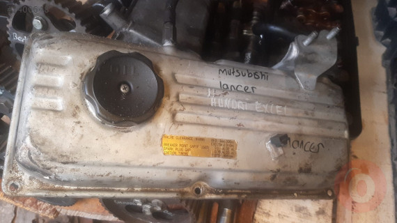 mitsubishi lancer çıkma külbütör kapağı