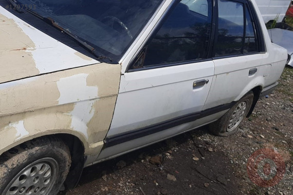 1988 model mazda 323 1.6 çıkma sol yan panel