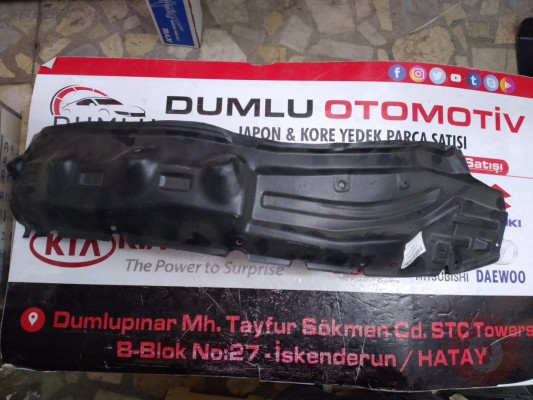 L200 çamurluk davlumbazı sol önün arkasındaki 07-14