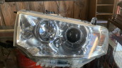 MİTSUBİSHİ L200 SOL FAR MERCEKLİ 2010-2015 8301A877