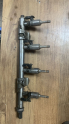 04E133320D vw golf7 enjektör kütüğü