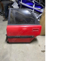 Mazda 323 sol arka kapi