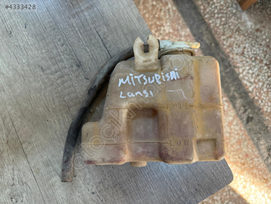 MİTSUBİSHİ LANCER SU FISKİYE BİDONU 1990 MODEL ORJİNAL ÇIKMA