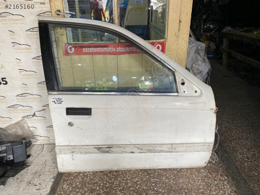 MİTSUBİSHİ LANCER SAĞ ÖN KAPI DOLU 1990 MODEL ORJİNAL ÇIKMA