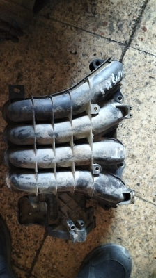 Mitsubishi Colt 1.3 emme Manifold MN143823 used 2010