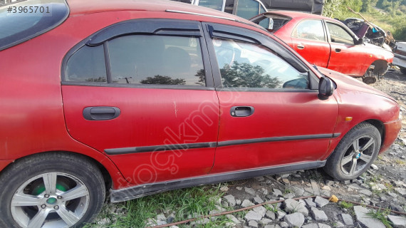 Mitsubishi karizma sag kapilar yedek parça