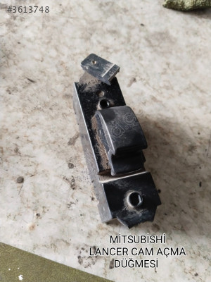 MİTSUBİSHİ LANCER ORJİNAL TEKLİ CAM AÇMA DÜĞMESİ