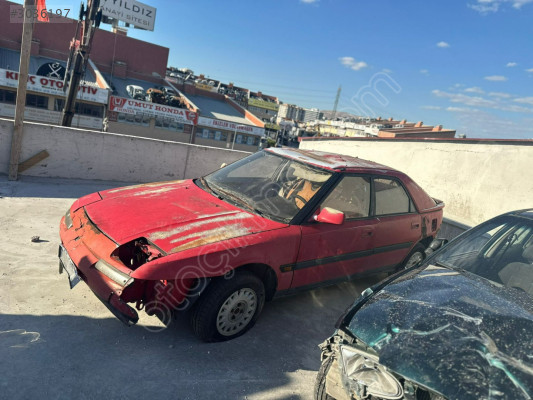 MAZDA 323 Kaput