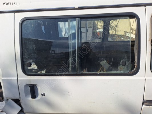 Mitsubishi L300 sol orta kapı camı