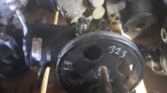 Mazda 323 85-89 arası direksiyon pompasi çıkma