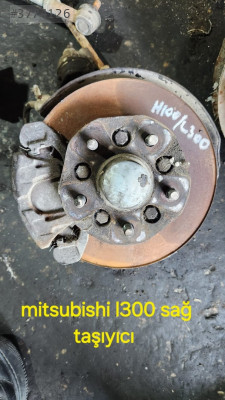 MİTSUBİSHİ L300 SAĞ TAŞIYICI                   (XS1206S25)
