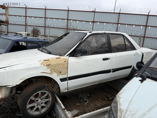 MAZDA 323 SOL ÖN KAPI ORJİNAL ÇIKMA SEDAN 1990-1995 MODEL