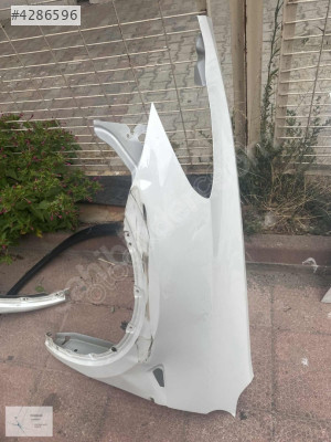 TESLA MODEL Y ÇAMURLUK SOL ÖN BEYAZ