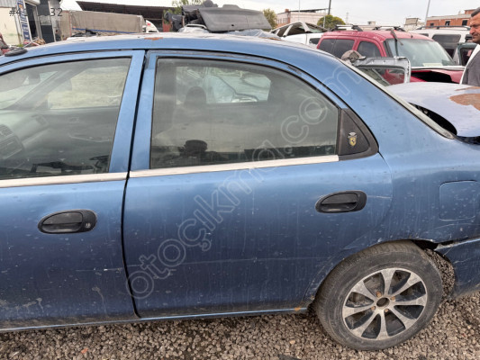 MAZDA 323 SOL ARKA KAPI