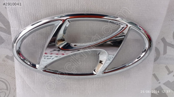 HYUNDAİ i10 i20 i30 TUCSON  ÖN PANJUR AMBLEMİ 86300-K7000