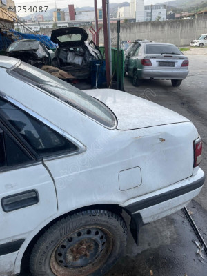 MAZDA 626 SOL ARKA ÇAMURLUK ORJİNAL ÇIKMA