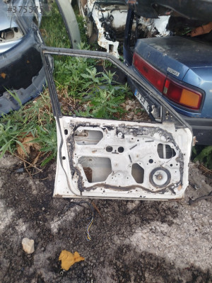 MAZDA 323 SOL ÖN KAPI