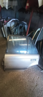 Mazda 323 sol arka kapı