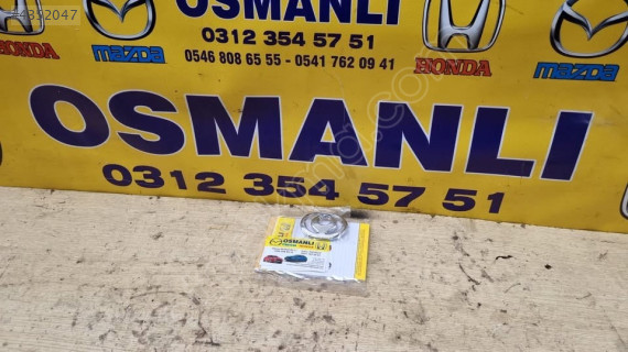 Mazda 323 panjur arması