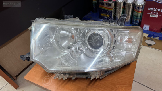 Mitsubishi L200 sol far mercekli